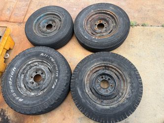 Four 6 lug Chevy or GMC c10 truck 15 inch steelies with old tires