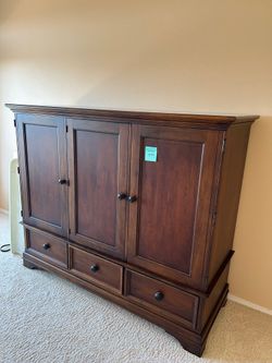 Traditional Dark Wood Storage Armoire with Drawers