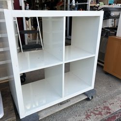 IKEA KALLAX 4-cube shelving unit in white