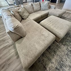 Living spaces sectional couch with storage ottoman