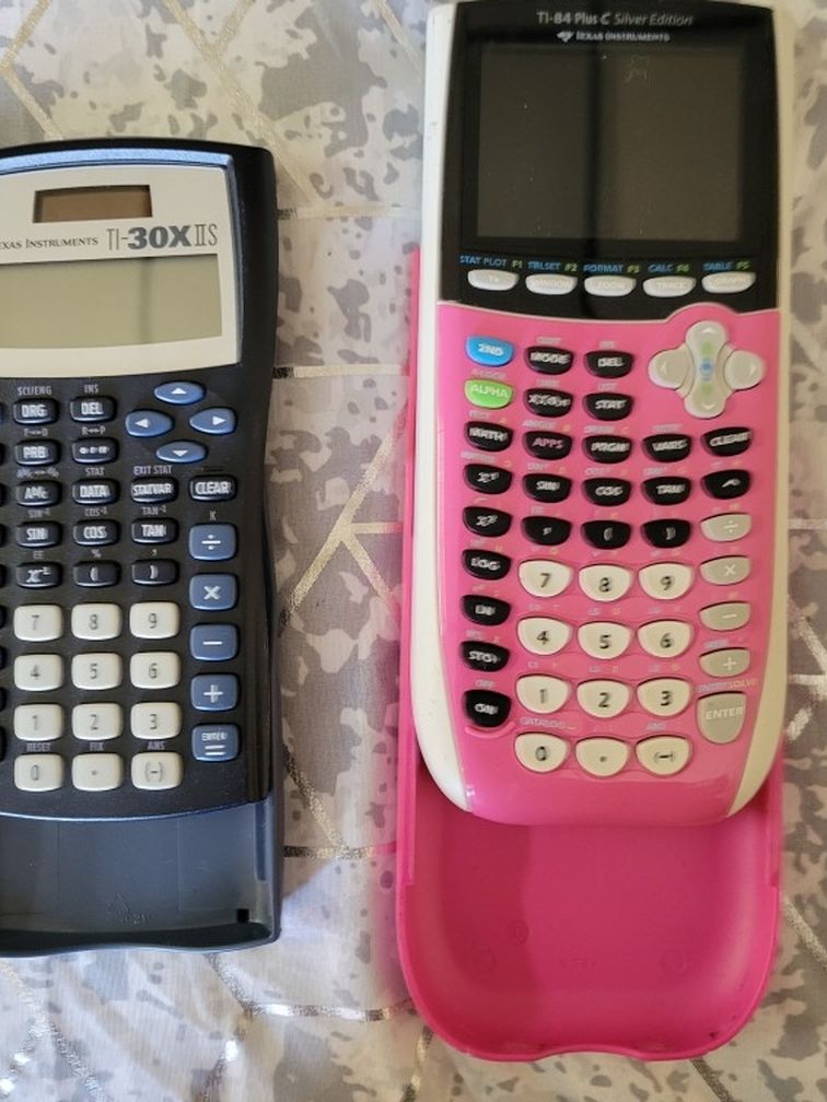2 Texas Scientific Calculators