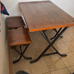Rustic pub height dining table with benches