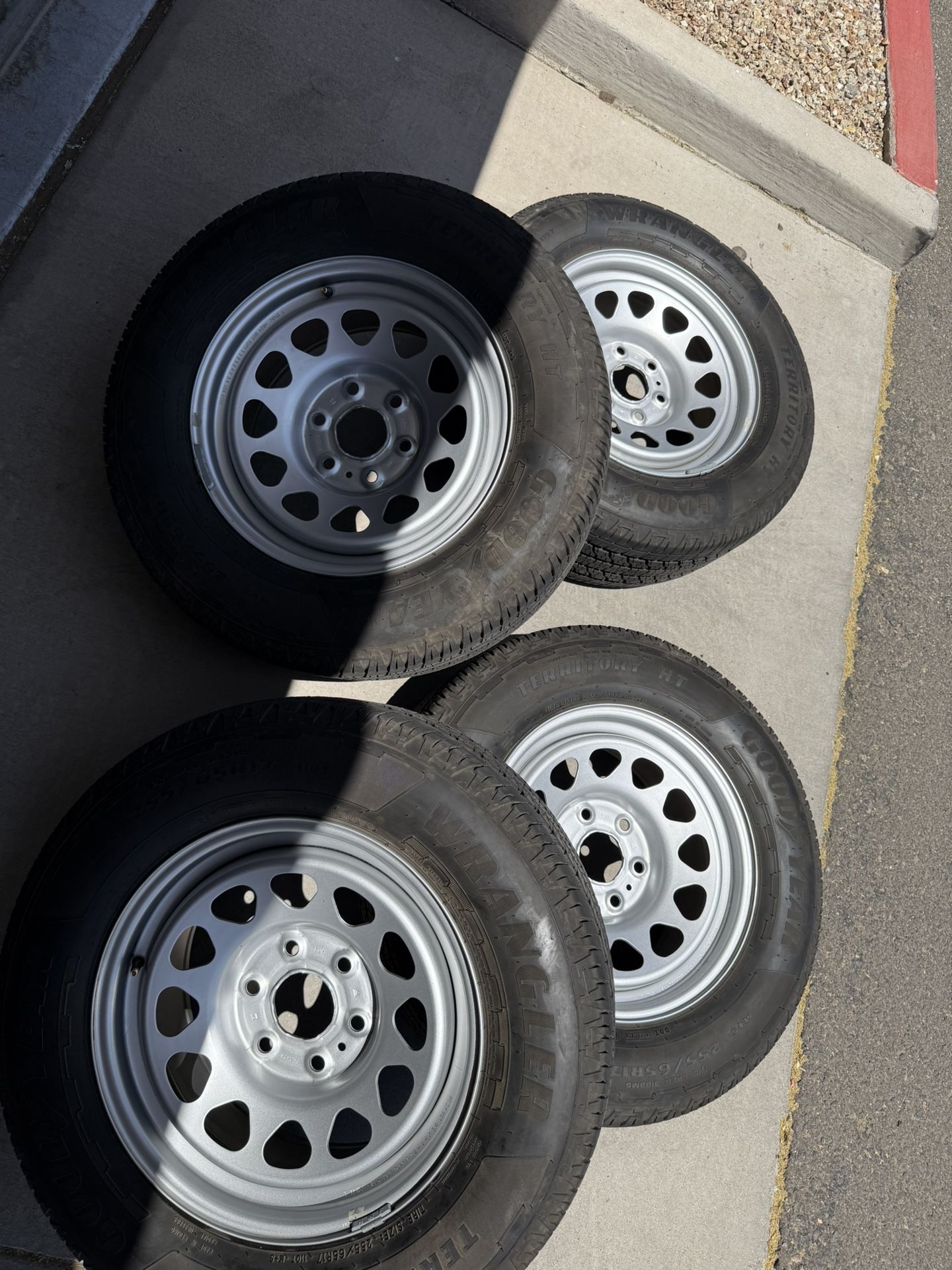Size: 255 65R17 Brand: Goodyear Wrangler Territory HT Barely used set of truck tires. Yes that means all 4 tires are for sale!!! Has barely 10k (10,0