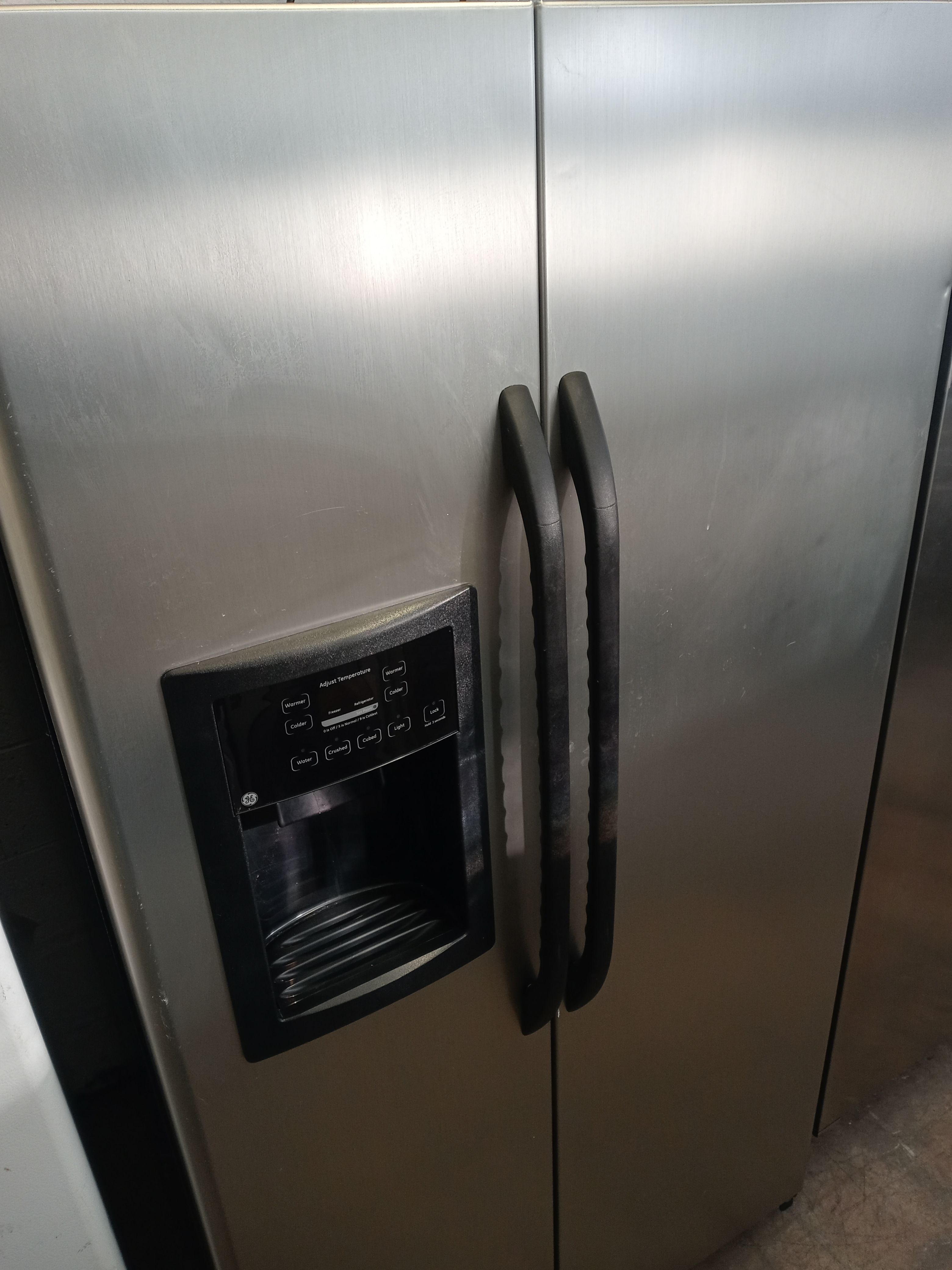 GE stainless steel side by side refrigerator - Free delivery