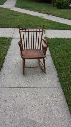 Antique Adirondack style wood rocking chair