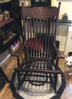 Pressed back antique rocking chair