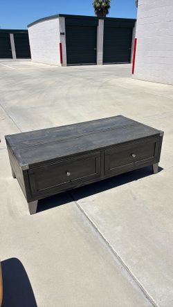 Coffee table with drawers and lift