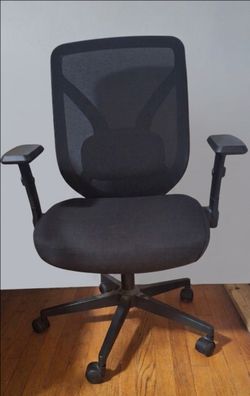 Black mesh office chair with back support