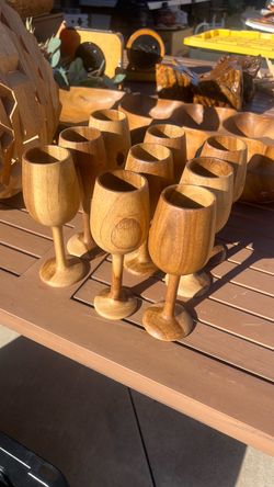 Set a nine hand carved walnut wine goblets
