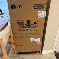 NEW never opened midsize refrigerator - LG 