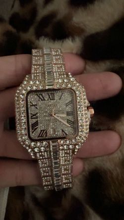 Iced out Cartier watch