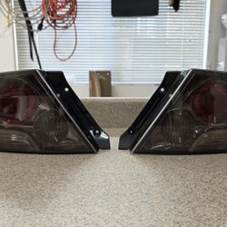 Mitsubishi Evo 8 MR Oem Tail Lights Smoked 