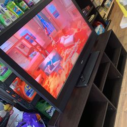 57in Flat Screen Tv And Stand $175