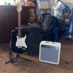 Musical Combo New. Amplifier, Electric Guitar, Connections Cords, Case , 