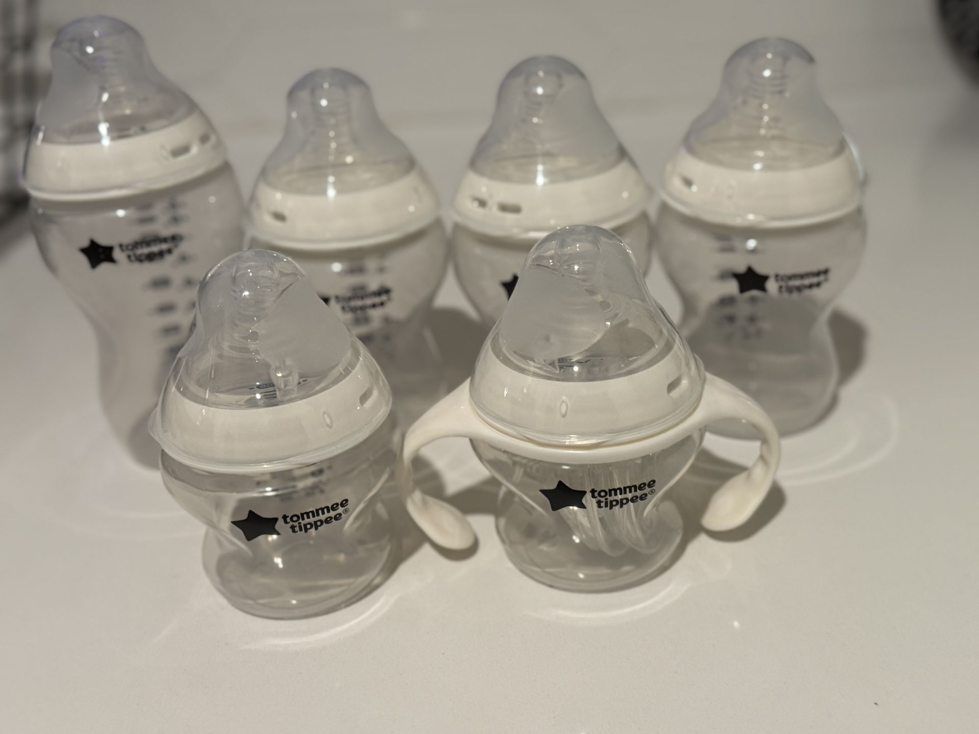 Tommie. Baby Bottles