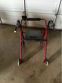Red Rolling Walker with Seat and Brakes