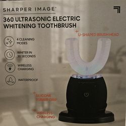 This is a Sharper Image 360° Ultrasonic Electric Whitening Toothbrush. 