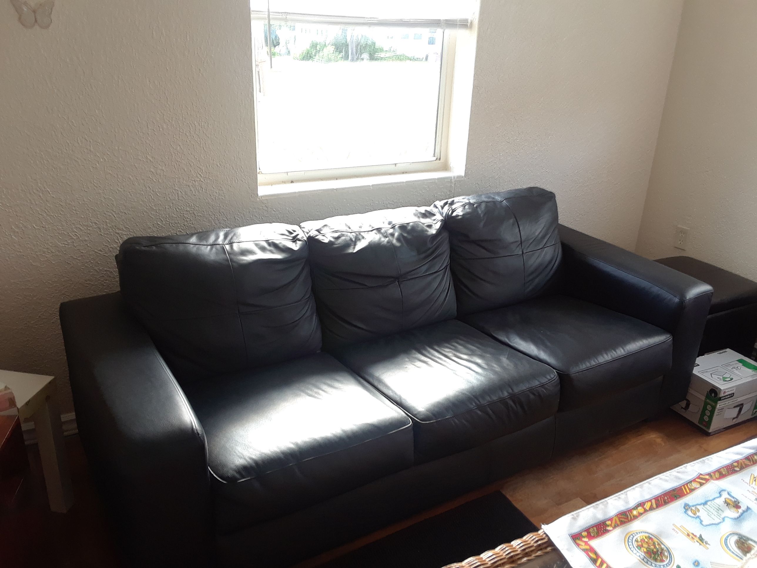 Barely used Black Leather Couch