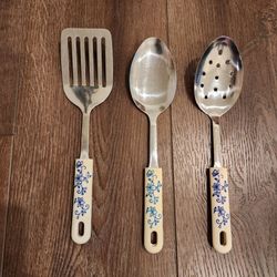 3 piece temtations stainless steel kitchen serving utensil set, white silicon handles with a blue floral cornflower, great condition