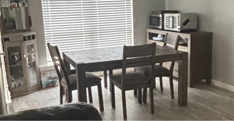 Dark Wood Dining Table with 4 Chairs and a bench