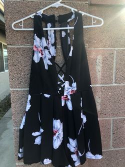 Laura’s boutique flowery romper