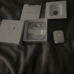 2nd Gen Airpods open box with everything in the box 