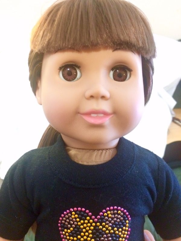 18" doll, like new, no tag. FCM 1996. Dress and shoes.