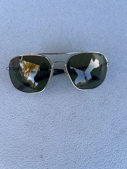 Ray Ban.  Polarize, sunglasses, carbon fiber sides.