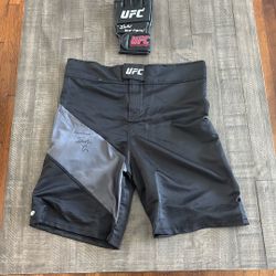 Jarrett “Flash Gordon” Signed And Inscribed Glove And Trunks