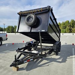 NEW DUMP TRAILER 8X12X4 12000 LBS
ROLLING TARP--SPARE TIRE,ELECTRIC BRAKES,HYDRAULIC SYSTEM,REMOTE CONTROL,IDEAL FOR HAULING, DEMOLITION, TRASH ETC,