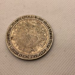 1987  RESORTS INTERNATIONAL  CASINO TOKEN - One Dollar