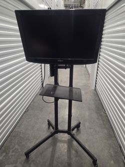 TV Stand w/shelfs and TV w/power strip bundle.