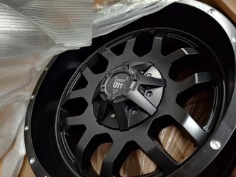 New 20x10 8 lug universal rims and terrain tires. $0 down to ride today. Ulohos 2940 N Keystone Mon-Sat 10-6