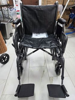 Black Folding Wheelchair with Footrests
