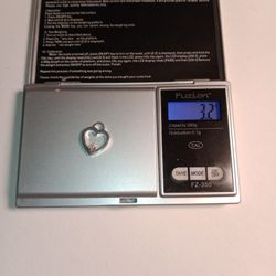 Beautiful Heart Pendant With .10 Carats Diamonds.3.7 Grams