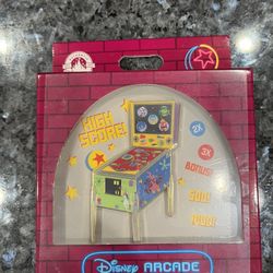 Disney Parks Disney Arcade Pixar In Side Out Pinball Machine Limited Edition 1500 Pin.  Brand new never opened.  