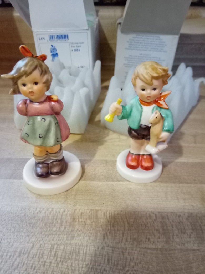 2 Hummel Figurines =Both For 10$