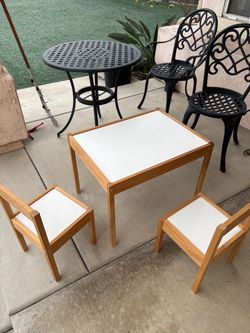 Kids table w/ two chairs