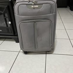 Very clean and in good condition suitcase. It measures 23 inches high, 14 inches wide, and 8 inches deep. It has 4 wheels.