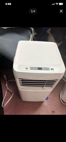 LOW PRICE MOVING- MIDEA $520 retail AIR CONDITIONER