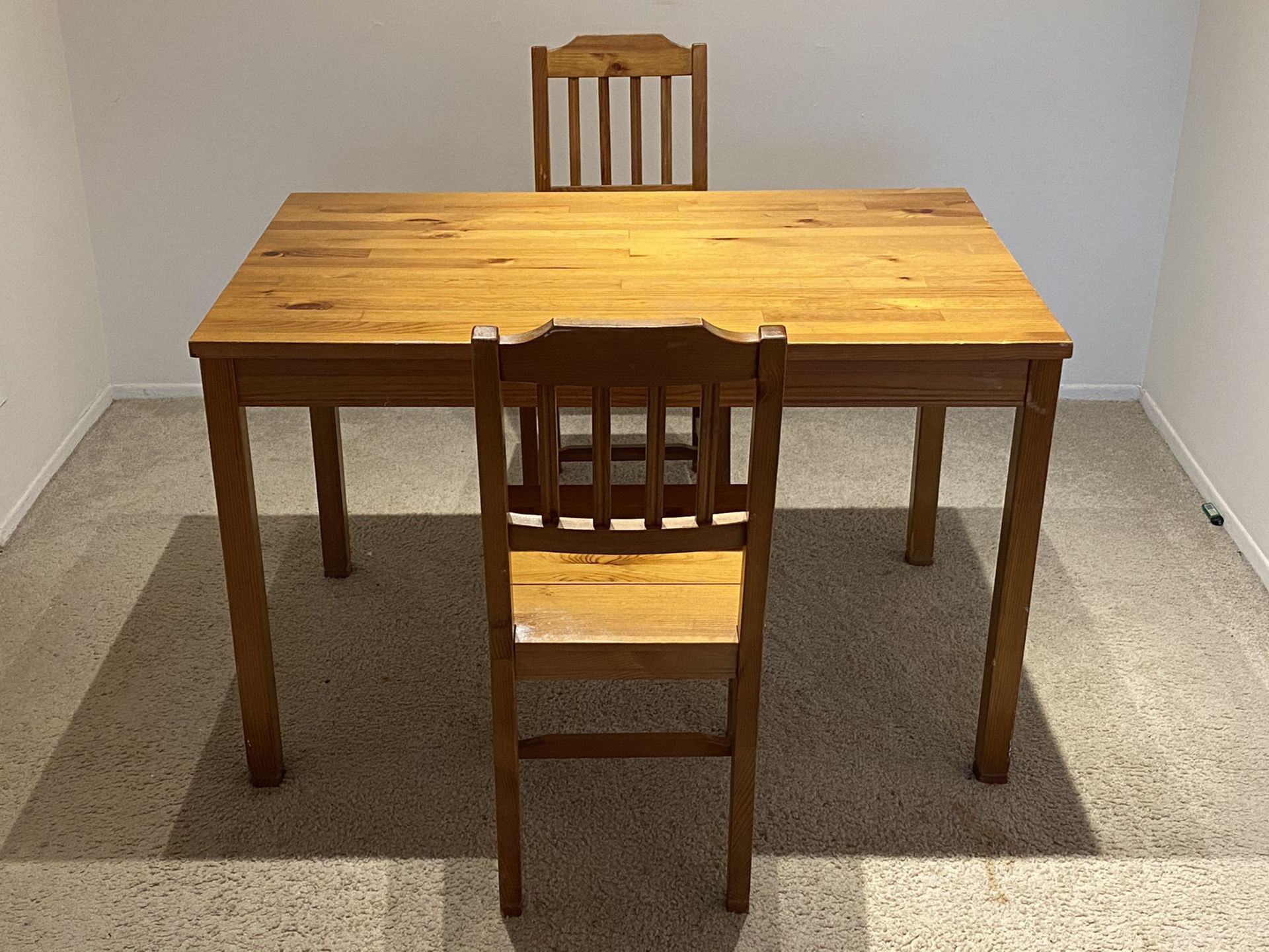 Dining table with two chairs