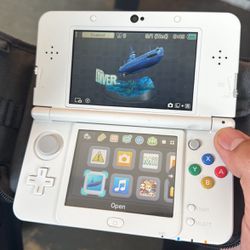 “new” 3ds With 3 Games 
