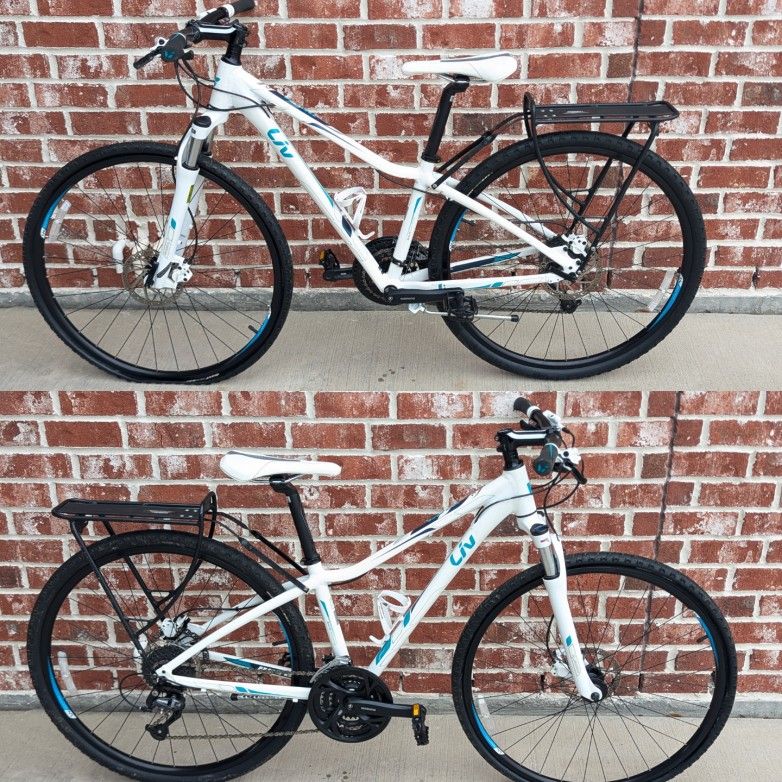 Liv Rove Ladies Mountain Bike Bicycle by Giant with Carry Rack Specialized Handlebar Shimano Pedals
Tires are Giant 700 x 40c S-RX4 front tire needs a
