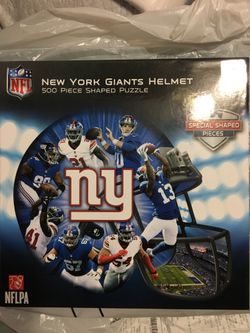 New York Giants 500 piece helmet puzzle size 25” X 22” by Masterpieces Inc.