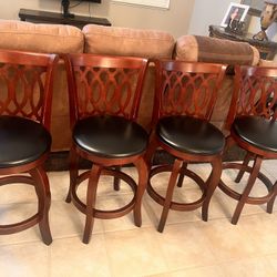 4 COUNTER HEIGHT SWIVEL BARSTOOLS - DARK WOOD, BLACK LEATHER ROUND SEATS - 