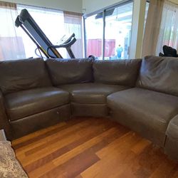 Brown learher couch, brown leather recliner, coffee table