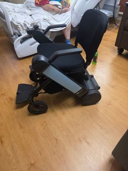 Whill travel lightweight folding power chair used on 2 trips scooter