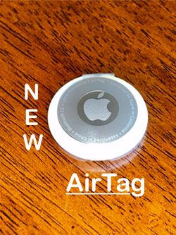 NEW apple AirTag  ( includes a free tag holder) 