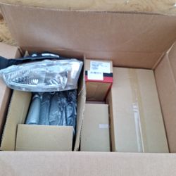 Mitsubishi Headlight Assembly 97-02