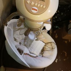 BABY SWING Used Twice Comes With A Pack Of Diapers 